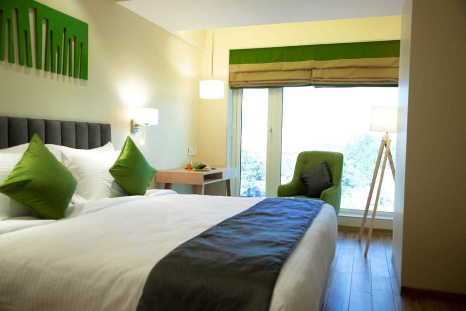 Deluxe Double or Twin Room, 1 Double Bed, Non Smoking | Minibar, in-room safe, desk, soundproofing