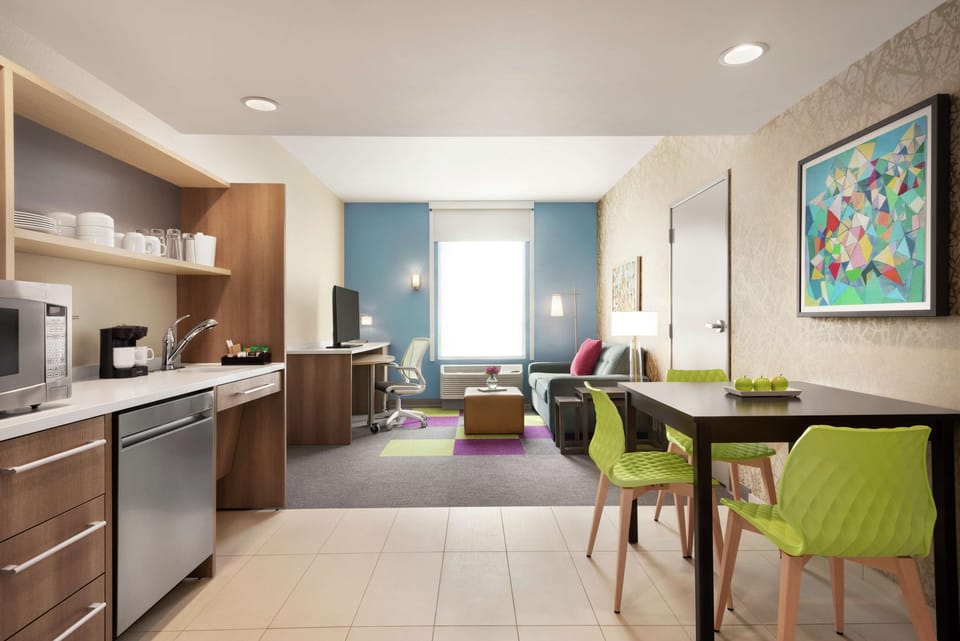 Suite, 1 Queen Bed, Accessible (Roll-In Shower) | Desk, laptop workspace, blackout drapes, iron/ironing board