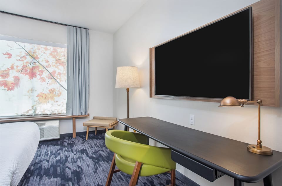 Room, 2 Queen Beds | Living area | 55-inch LCD TV with premium channels, TV