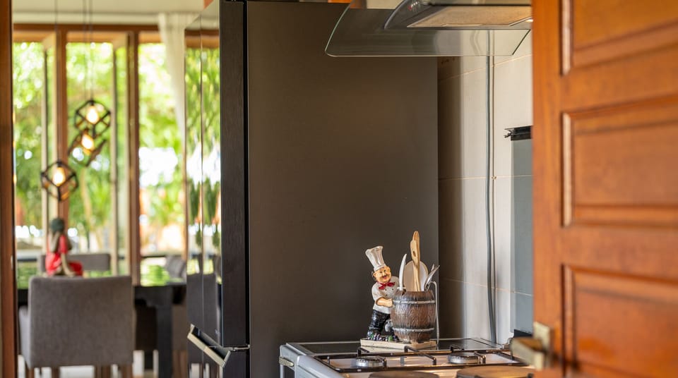 Villa, 4 Bedrooms | Private kitchen | Fridge, microwave, coffee/tea maker, electric kettle