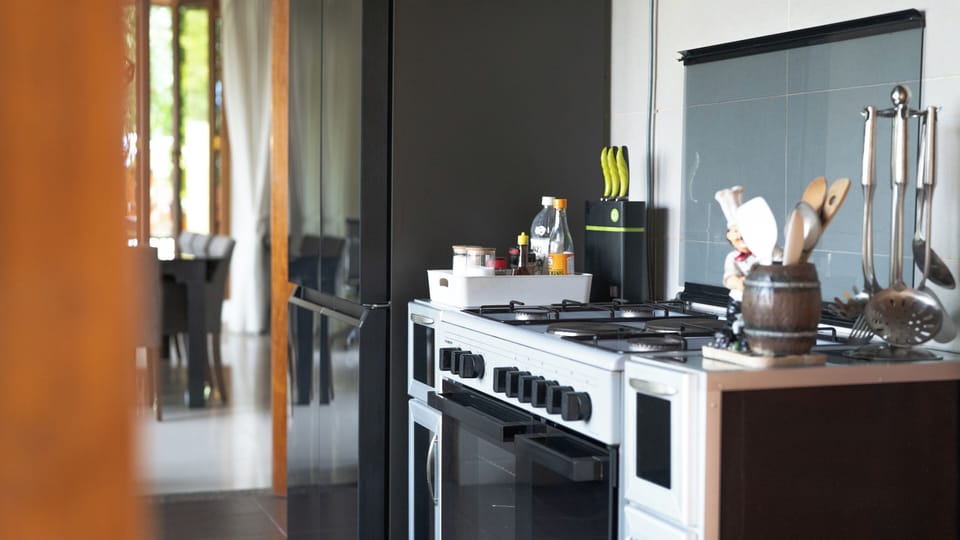 Villa, 4 Bedrooms | Private kitchen | Fridge, microwave, coffee/tea maker, electric kettle