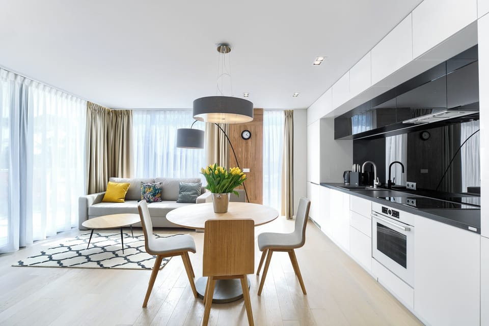 Deluxe Apartment | Living area | Flat-screen TV