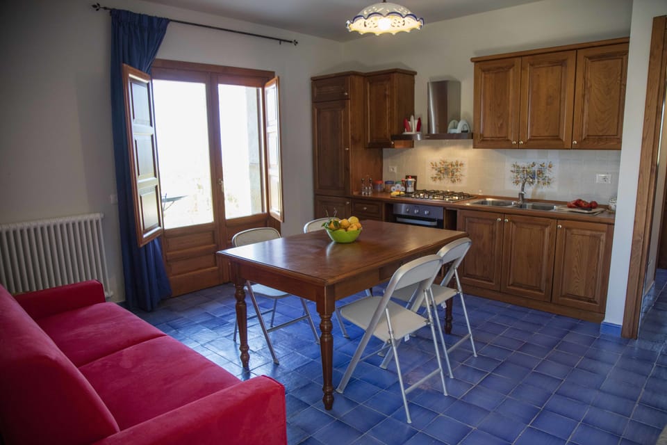 Apartment, 1 Bedroom, Sea View | Private kitchenette | Full-size fridge, oven, stovetop, electric kettle