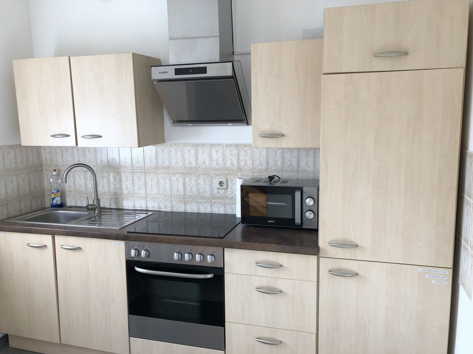 Apartment | Private kitchen | Oven, stovetop, coffee/tea maker, cookware/dishes/utensils