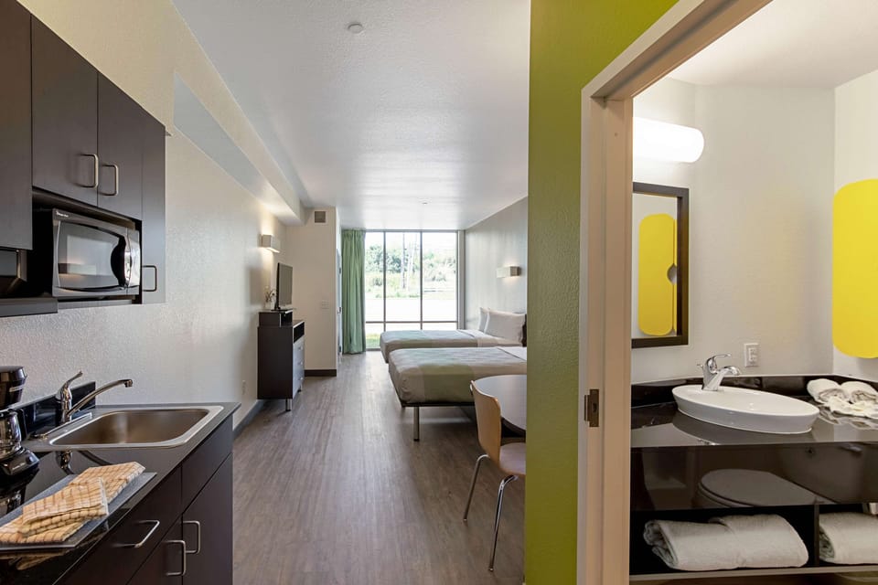 Laptop workspace, free WiFi, bed sheets
