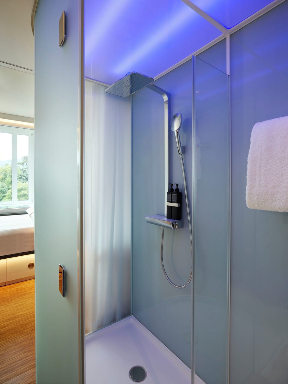 Shower, hydromassage showerhead, eco-friendly toiletries, hair dryer