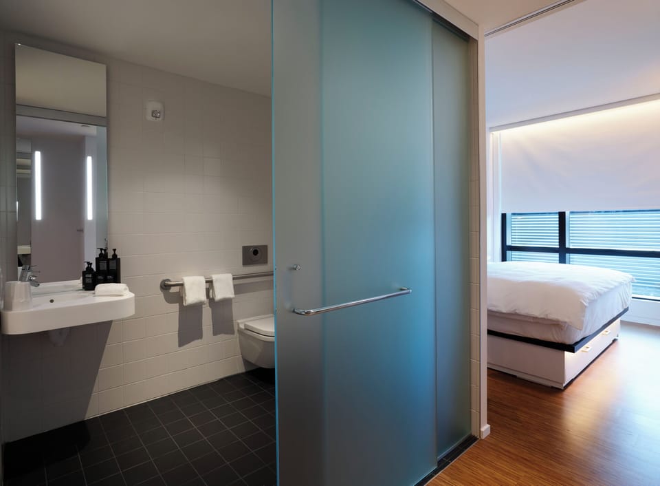 Room, 1 King Bed (Mobility Accessible, Roll-In Shower) | Premium bedding, pillowtop beds, in-room safe, desk