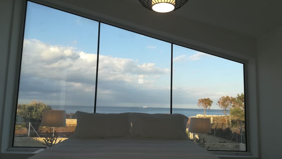 Panoramic Double Room, Sea View | 1 bedroom, minibar, individually decorated, individually furnished