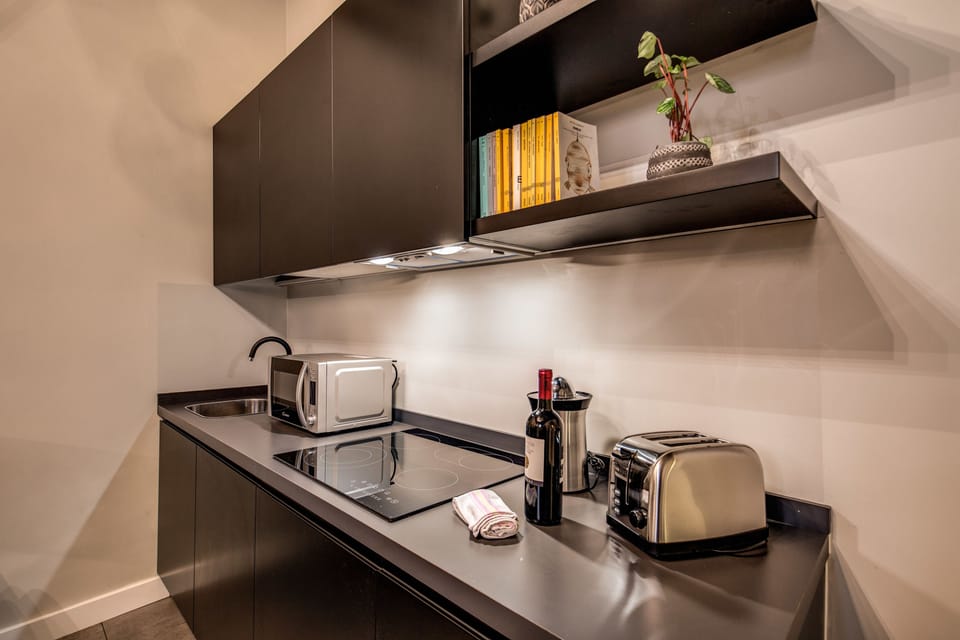 Apartment, 1 Bedroom | Private kitchenette | Fridge, microwave, stovetop, cookware/dishes/utensils