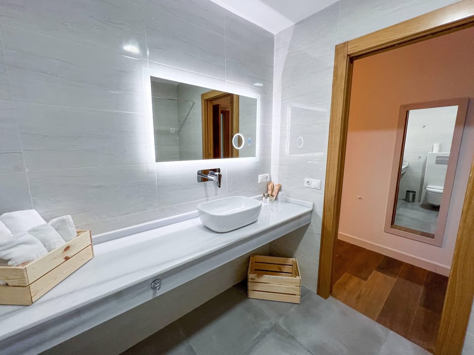 Eco-friendly toiletries, bidet, towels, soap