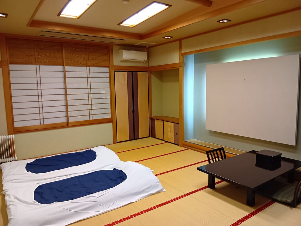 Japanese Room With Shared Washroom- Family | In-room safe, free WiFi, bed sheets
