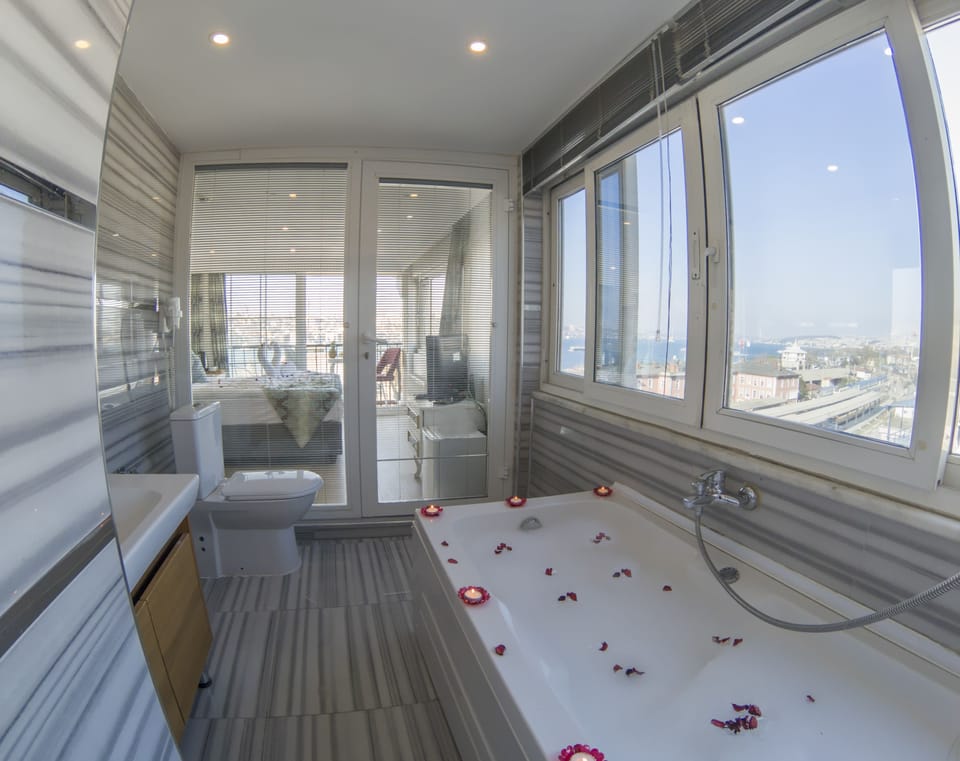 Deluxe Room, 1 Double Bed, Sea View, Overwater | Bathroom | Shower, free toiletries, hair dryer, slippers