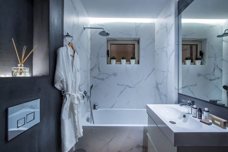 Shower, free toiletries, hair dryer, bathrobes