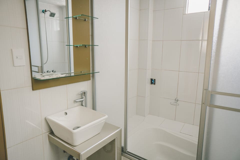 Deep soaking tub, rainfall showerhead, free toiletries, towels