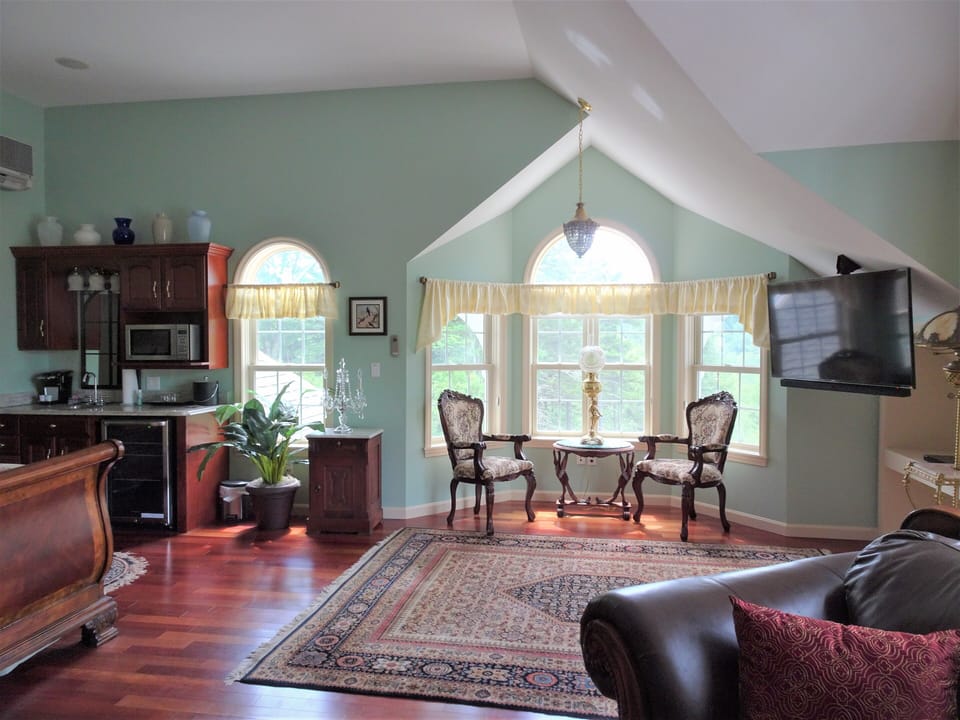 Upstairs suite left side of house. Wet bar, sitting area