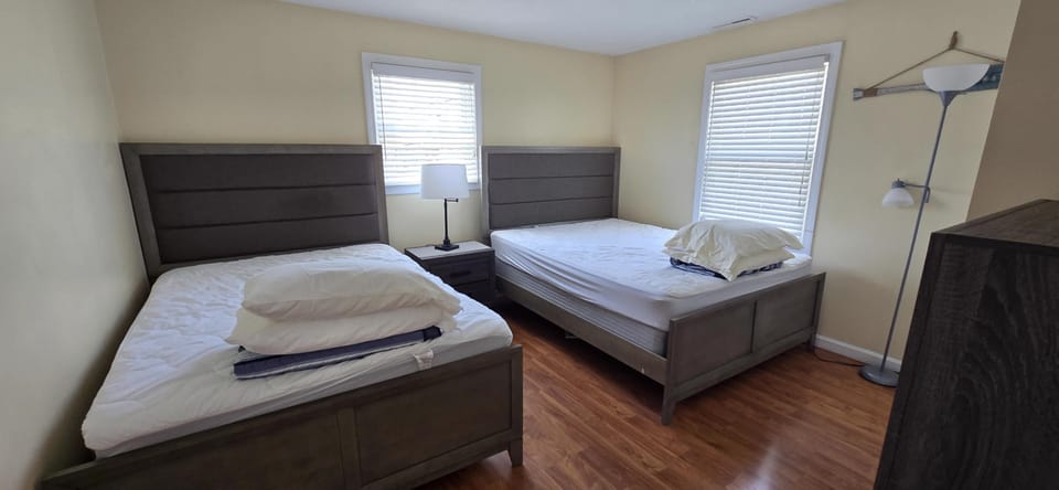 Primary bedroom, Queen Bec.  Comforters, Blankets and Pillows provided. 