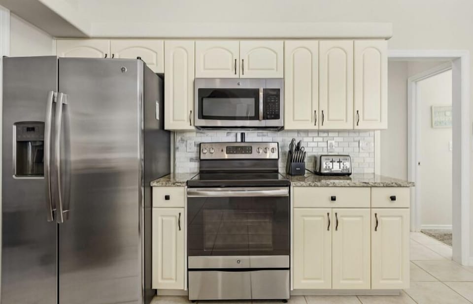 New stainless steel appliances throughout kitchen to include a wine chiller!
