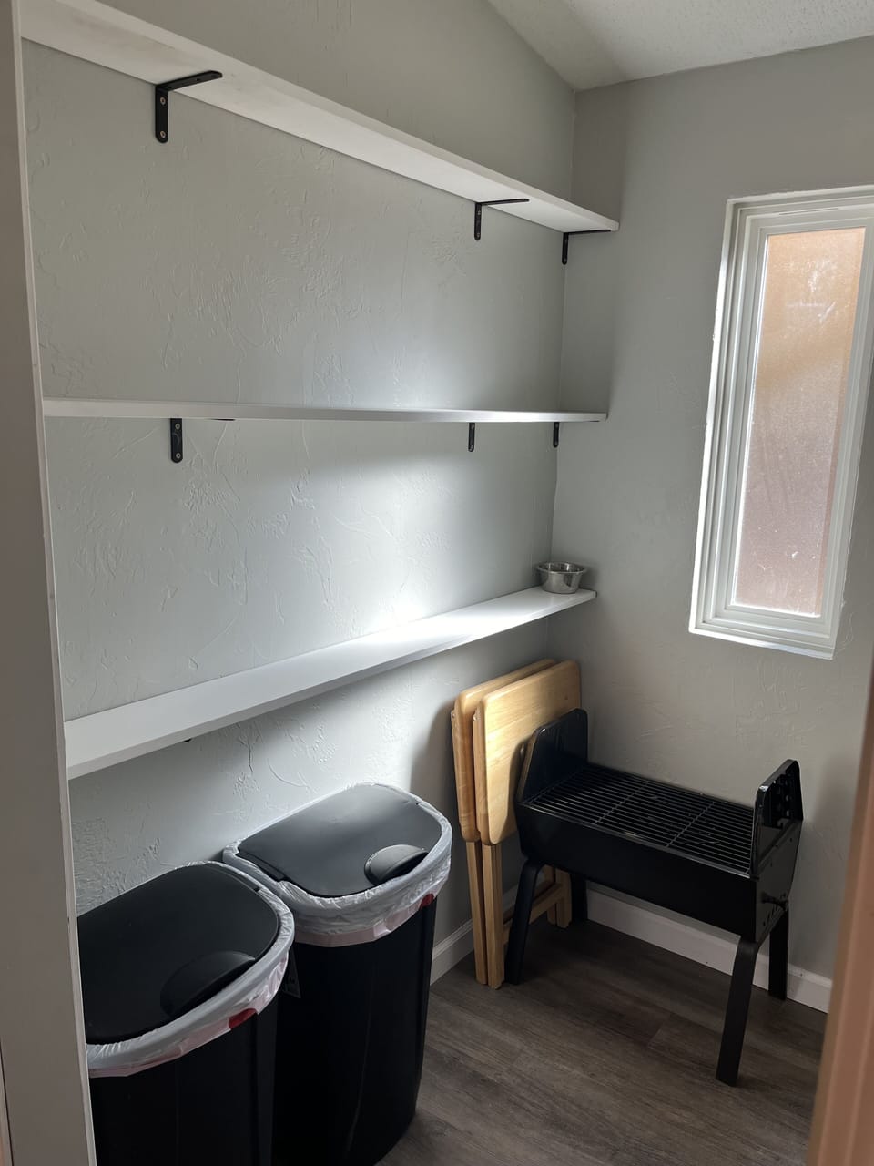 Pantry shelving in laundry room