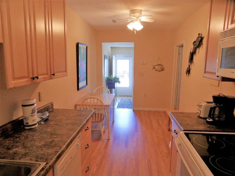 Gally kitchen next to living area