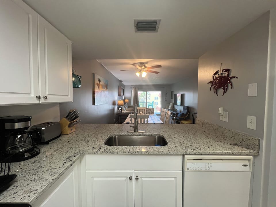 The kitchen overlooking the living/dining room