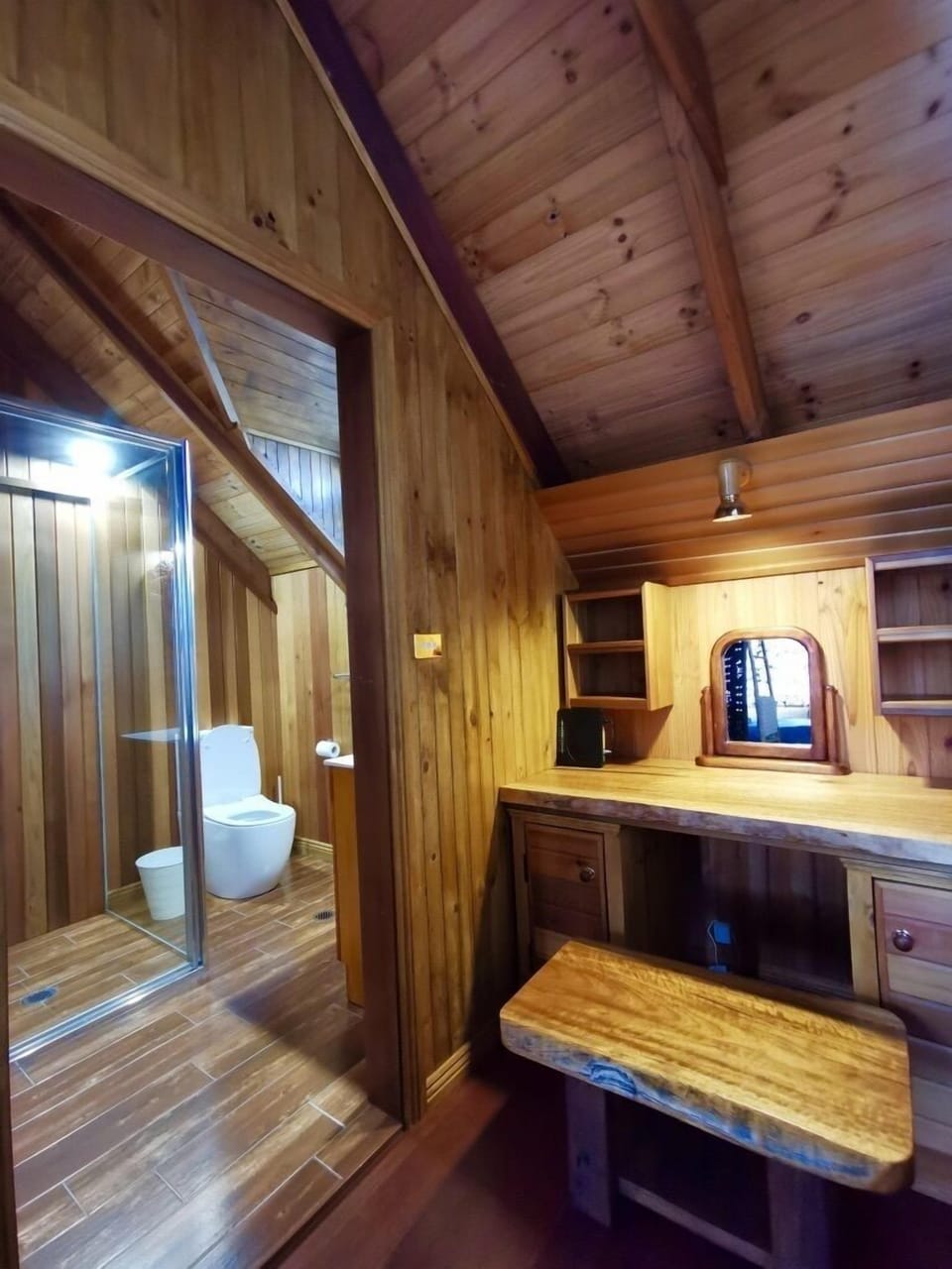 The charming study corner and ensuite of the upstairs master suite.