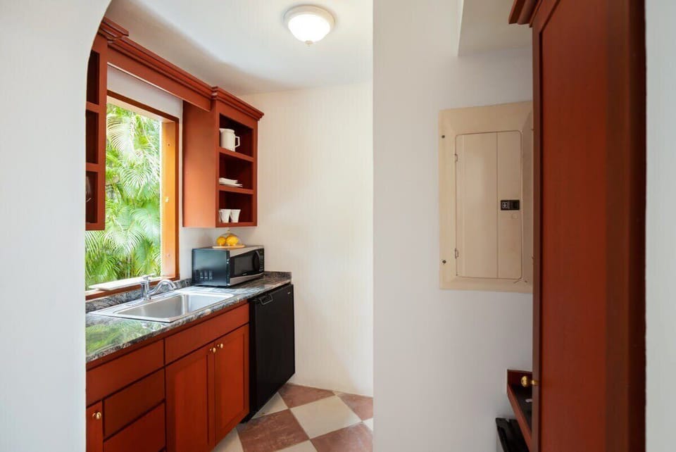 Microwave, mini stove and refrigerator 