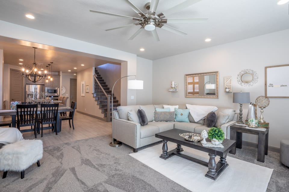 Living Room - The Living Room is located adjacent to the dining room and is the perfect place to relax and watch your favorite movie or TV program.