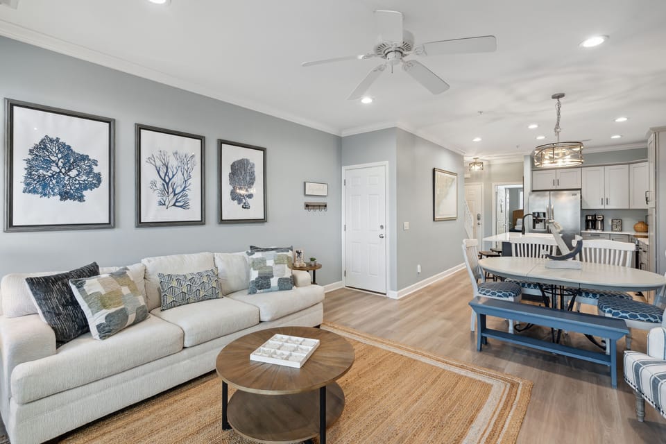 Cozy living room with access to screened in patio.