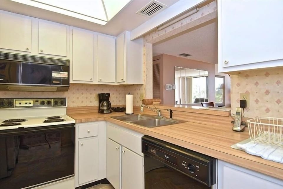Kitchen open window to dining area