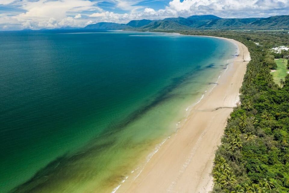 Six Beachside Port Douglas:  Stunning four mile beach a few steps from your door.