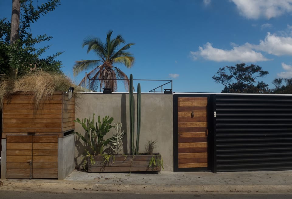 Extremely private and secure 10' wall of concrete and metal surround the entire 