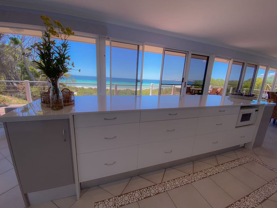 Kitchen views all wrapped around the front living rooms from east to west