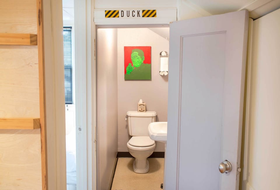 A half bathroom adds convenience to your stay.