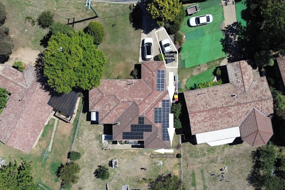 Single Off Street Park with arrows to the Apartment down the side