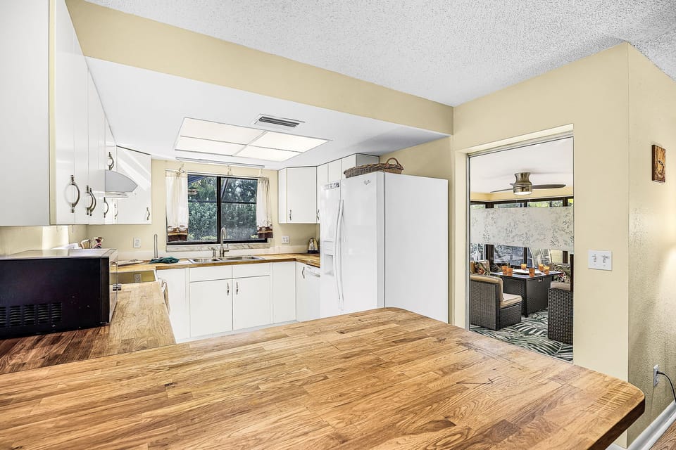The kitchen is right off of the Florida Room