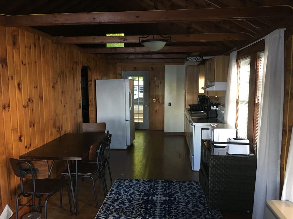 living area looking toward the kitchen to the front door 