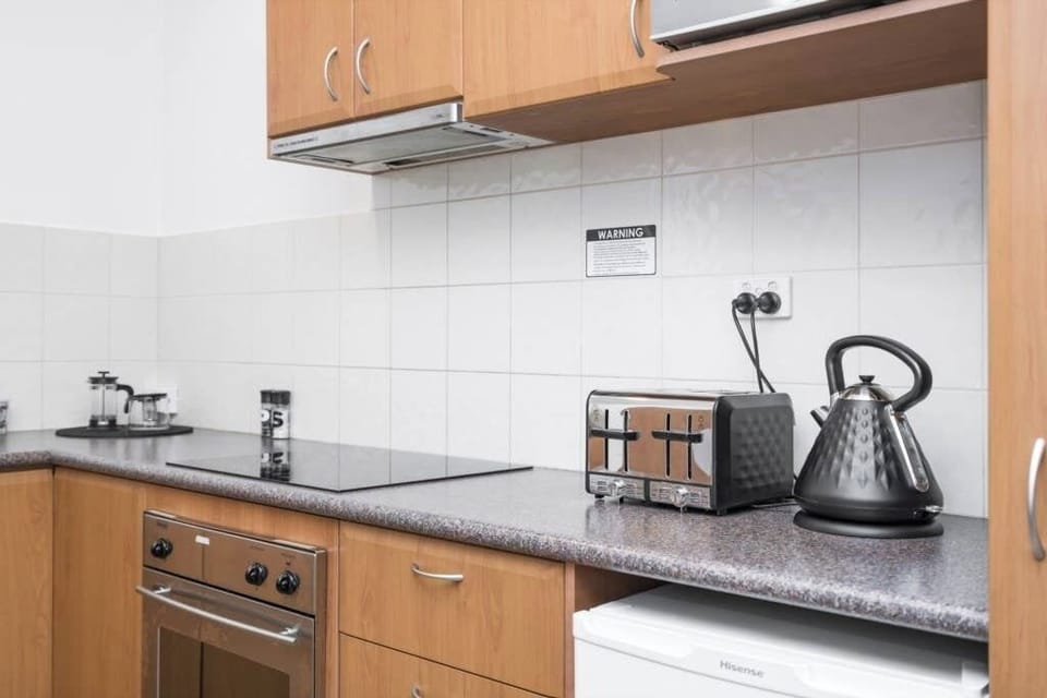 Enjoy this full kitchen, oven stove, toaster, microwave & kettle