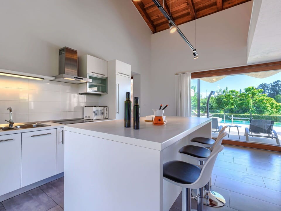Cabinetry, Building, Property, Furniture, Countertop, Plant, Table, Window, Kitchen Appliance, Wood