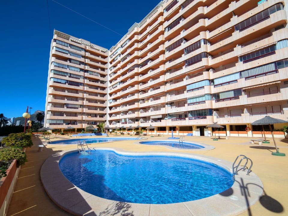 Building, Water, Sky, Property, Swimming Pool, Plant, Azure, Window, Architecture, Condominium