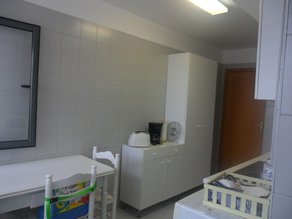 Kitchen - sterilizer, baby bottle heater and baby high chair.