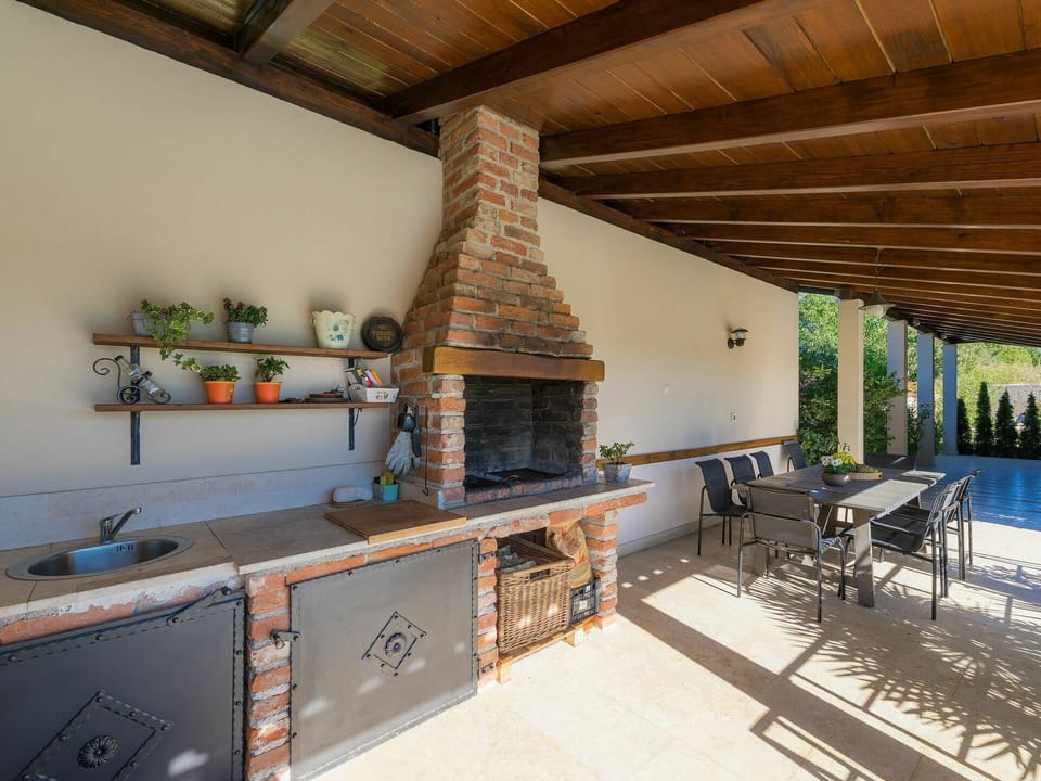 Furniture, Cabinetry, Property, Countertop, Building, Wood, Chair, Interior Design, Kitchen Stove, Floor