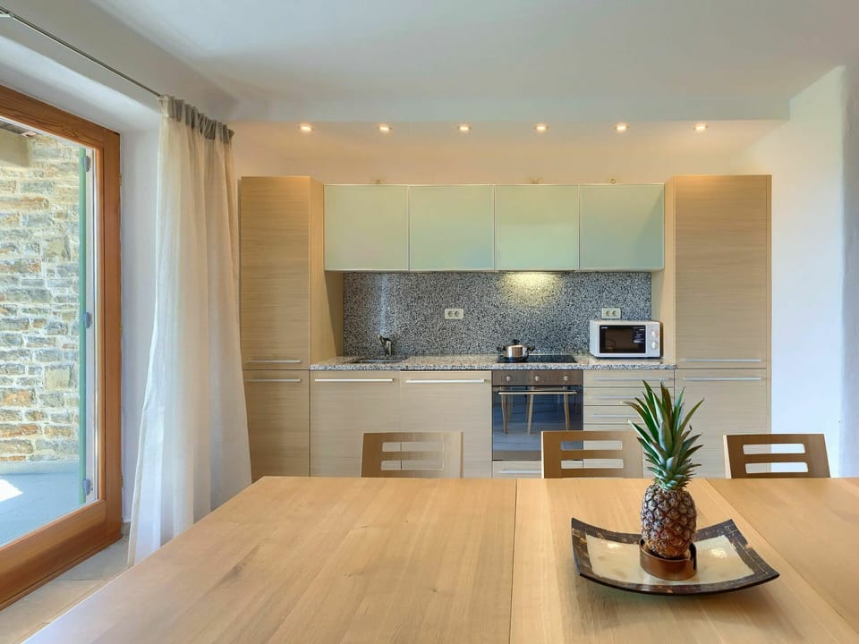 Property, Furniture, Table, Plant, Cabinetry, Flowerpot, Wood, Houseplant, Interior Design, Flooring