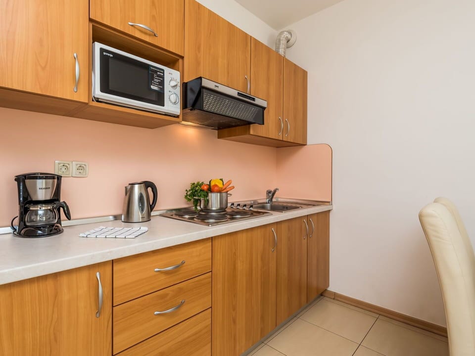 Property, Room, Countertop, Cabinetry, Kitchen, Furniture, Yellow, Building, House, Interior Design