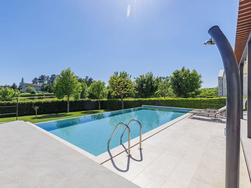 Water, Sky, Plant, Property, Swimming Pool, Building, Azure, Shade, Rectangle, Tree