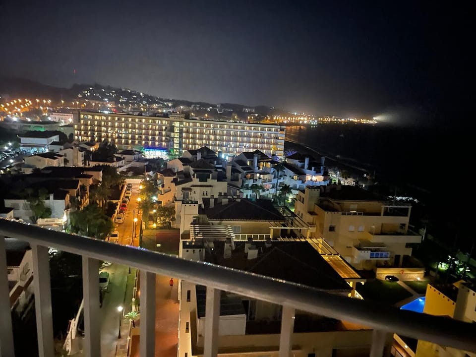 NIGHT TIME VIEW FROM THE BALCONY