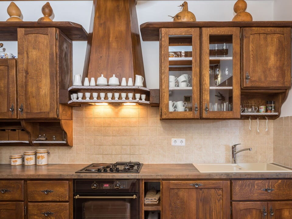 Cabinetry, Countertop, Kitchen, Furniture, Room, Property, Cupboard, Wood Stain, Tile, Interior Design