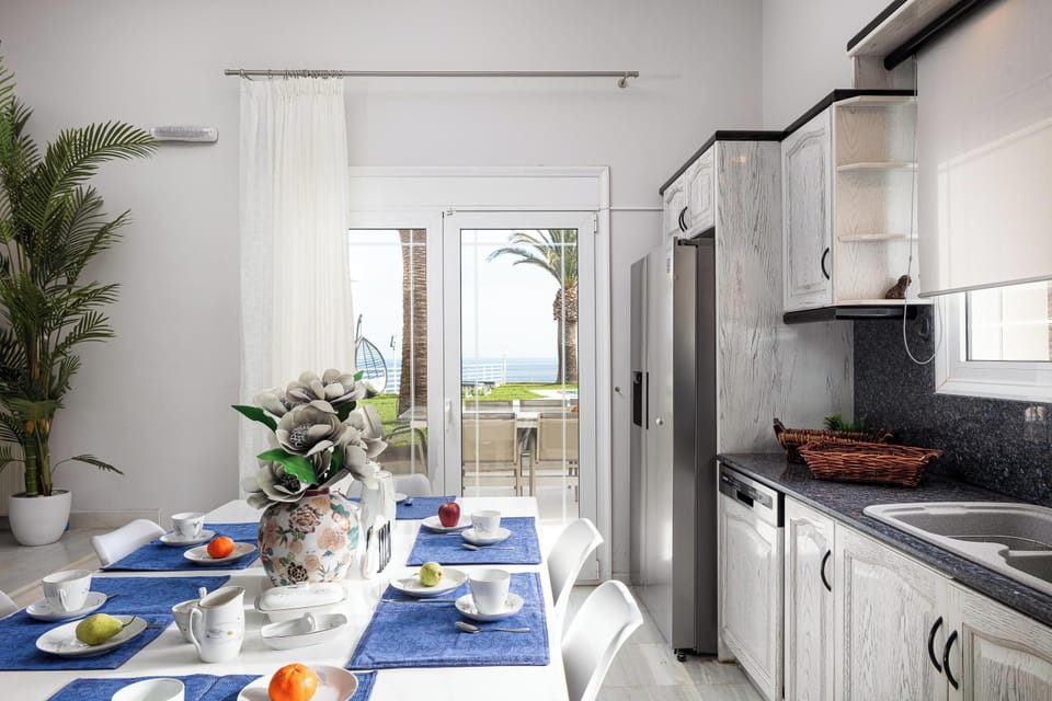Kitchen is directly connected to an outdoor dining area