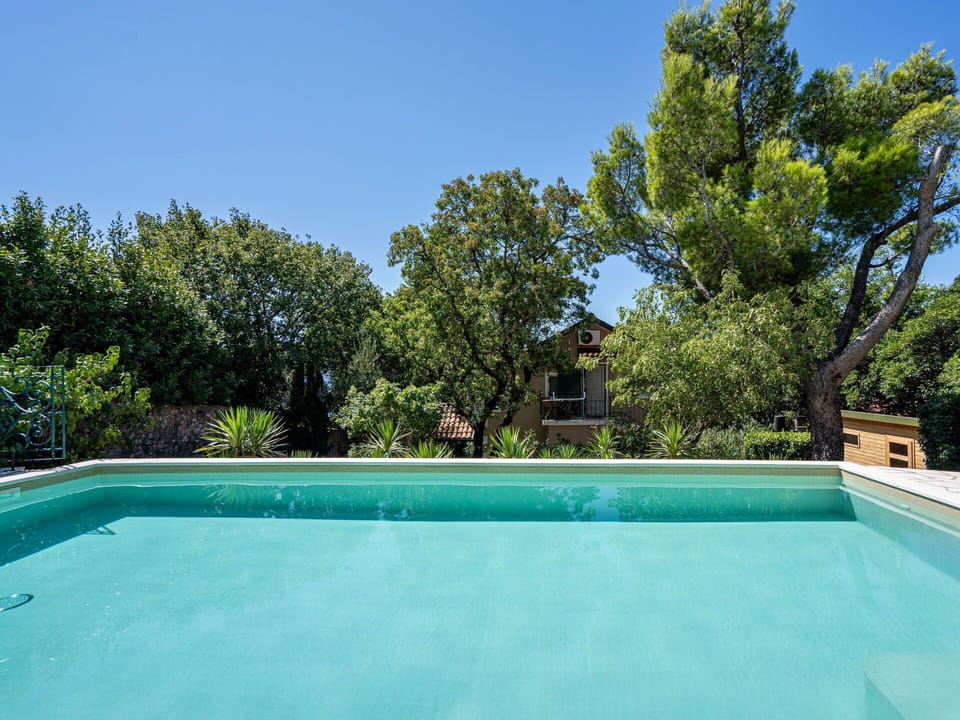 Water, Sky, Plant, Swimming Pool, Azure, Shade, Tree, Composite Material, Grass, Leisure