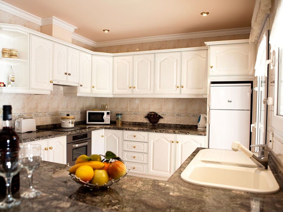 Countertop, Kitchen, Room, Cabinetry, White, Furniture, Interior Design, Property, Yellow, Home