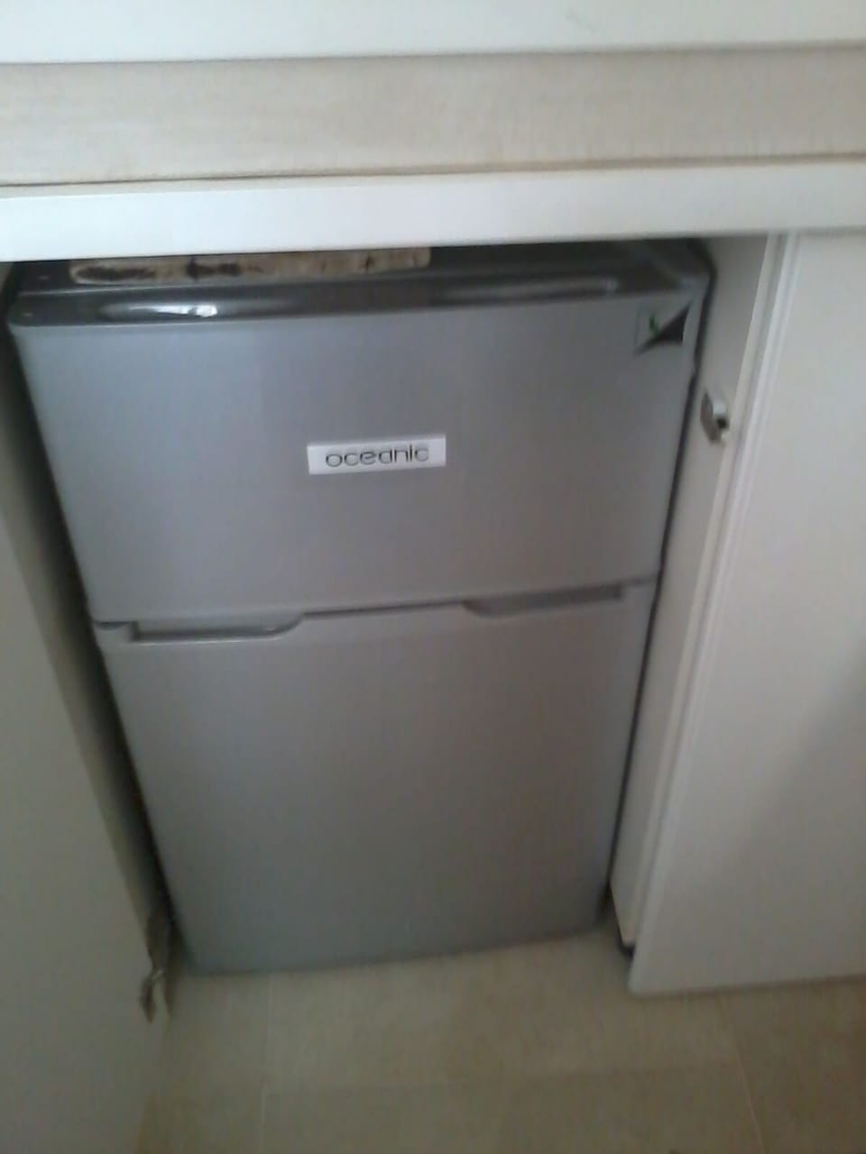 Refrigerator with freezer in the upper part.